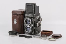 A Rolleiflex 2.8E 6x6 medium format TLR camera. Serial number 1627443.