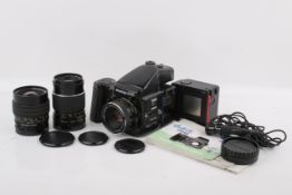 A Mamiya 645 Pro 6x4.5 medium format SLR camera outfit. Serial number NK1576.