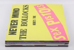 Ten assorted LP vinyl records mostly 1980s pop. Including Queen, David Bowie and The Police, etc.