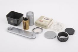 A small group of Leitz Leica accessories.