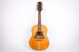 A 20th century guitar shaped mandolin (mandolinetto).