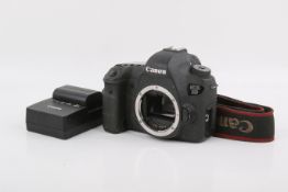 A Canon EOS 6D Digital SLR camera body. Powers on, shutter working. With battery and charger.
