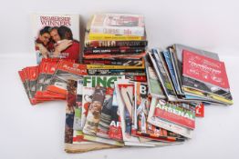 An assortment of Arsenal football club collectables.