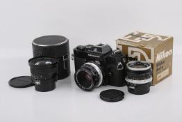 A Nikon EL 35mm SLR camera outfit. Black. Serial number 5212587.