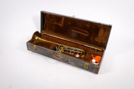 Bach Stradivarius Model 42 tenor trombone, cased. Stamped #4933, with a mouth piece.