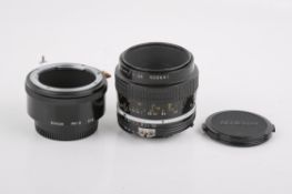 A Nikon 55mm f3.5 Micro-Nikkor lens. Serial number 900641. With Nikon PK-3 27.