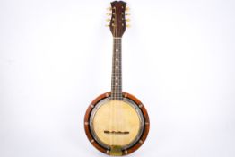 An English 20th century 'Walliostro Zither Mandoline' banjolele and case.
