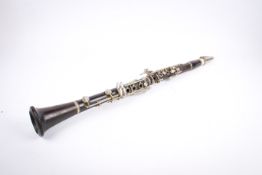 A 20th century Boosey & Hawkes Regent rosewood clarinet.