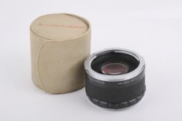 A Komura Telemore 95 tele-converter for Pentax 67. Optics VG, with case.