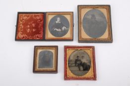 Four mounted Victorian Ambrotype photographic portraits.
