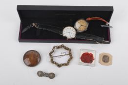 A mixed collection of jewellery and wristwatches.