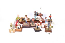 A group of hand painted lead and resin military figures.