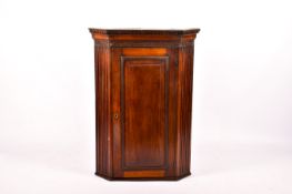 George III mahogany corner cupboard.