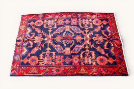 A 20th century Persian Hamadan rug.