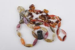 A group of assorted vintage costume jewellery.