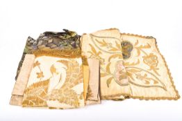 An assortment of antique and later embroidered fabric.