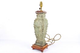 A 20th century archaic Chinese style bronze effect table lamp.