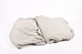 A large pair of Designers Guild floor length curtains.