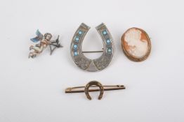 Four Victorian and later brooches.