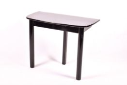 A contemporary C20 black lacquered console table.