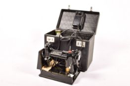 A Singer 221K sewing machine. In the original box with accessories, box H28cm.