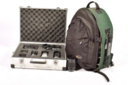 An assortment of cameras and accessories. Including an Olympus OM 10 in an aluminium case, etc.