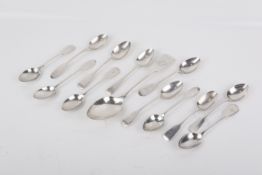 A collection of 19th century and later silver and white metal spoons.