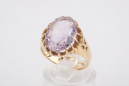 An 18ct gold and amethyst dress ring.