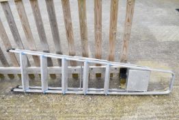 A set of aluminium folding step ladders by Belray.
