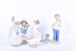 A group of assorted Spanish porcelain figures.
