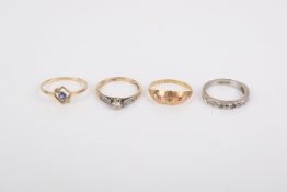 Four 18ct gold rings.