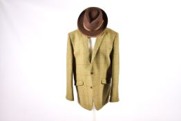 A gentleman's Harris Tweed jacket size 46 long and an 'Attaboy' brown Trilby hat size 7 1/8.