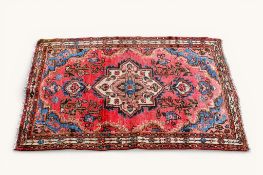 A 20th century Persian prayer rug.