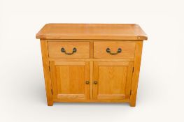 Modern solid light oak sideboard.