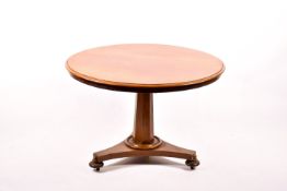 A Victorian mahogany circular supper table. On a tripartite base, Diameter 104cm x H69cm.