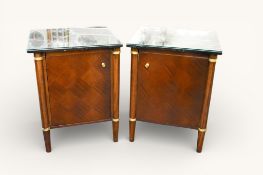 A pair contemporary Regency style marble top cupboards retailed by John Tanous Ltd.