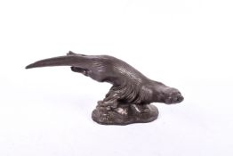 A Heredites bronze composition sculpture.