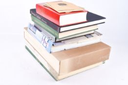 A box of miscellaneous books.