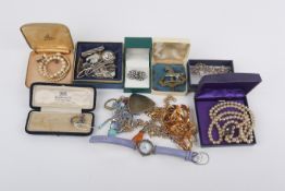 A collection of assorted costume jewellery. Including a silver bracelet, 17.
