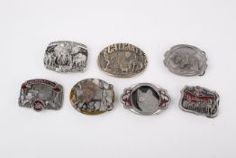 A collection of novelty belt buckles.