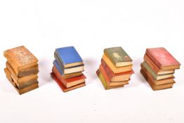 A box of assorted 19th and 20th century books.