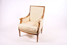 A 20th century Louis XVI style mahogany armchair with contemporary upholstery.