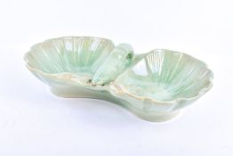 A contemporary green ceramic lobster and shell modelled dish.