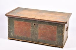 Antique painted pine trunk blanket box. Having Iron handles, lid opening to reveal a candle box.