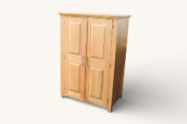 Modern light oak two door cupboard. Internal pull out shelf. Bird motif to inside of door.