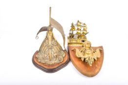 Three 20th century solid brass ornamental items. Including 'Victory' inkwell, etc.