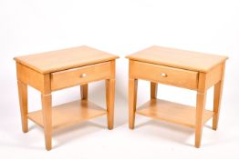 A pair of Ethan Allen, American, hardwood bedside tables.
