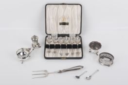 An assortment of silver and white metal.