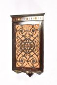 Late Victorian corner cupboard having scrolling fretwork door.