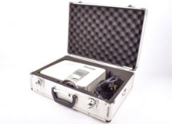 A Benq multi-media projector in an aluminium case.